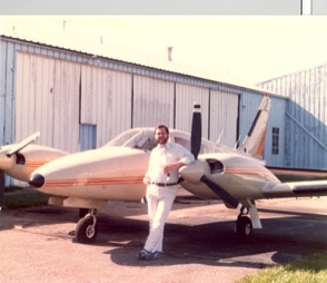 David J. Koch standing beside a Piper PA-34 Seneca while building single-engine and multi-engine flight experience on his way to becoming an Airline Transport Pilot, illustrating rehabilitation, perseverance, and successful prisoner reentry through aviation.